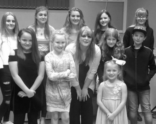 Emma Sheldon with Students